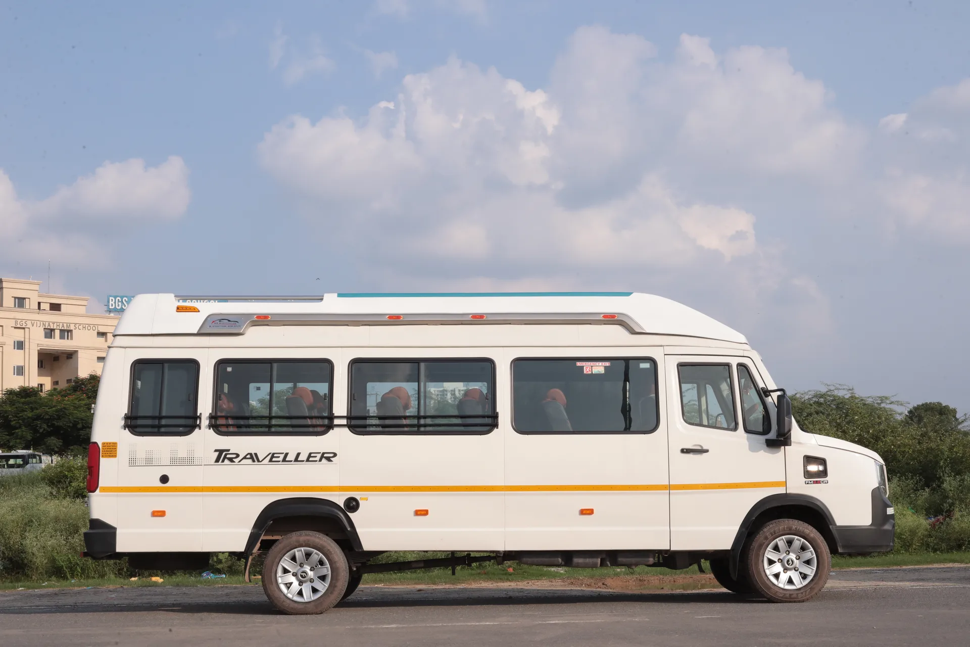 White 21-seater Force Traveller van for group travel